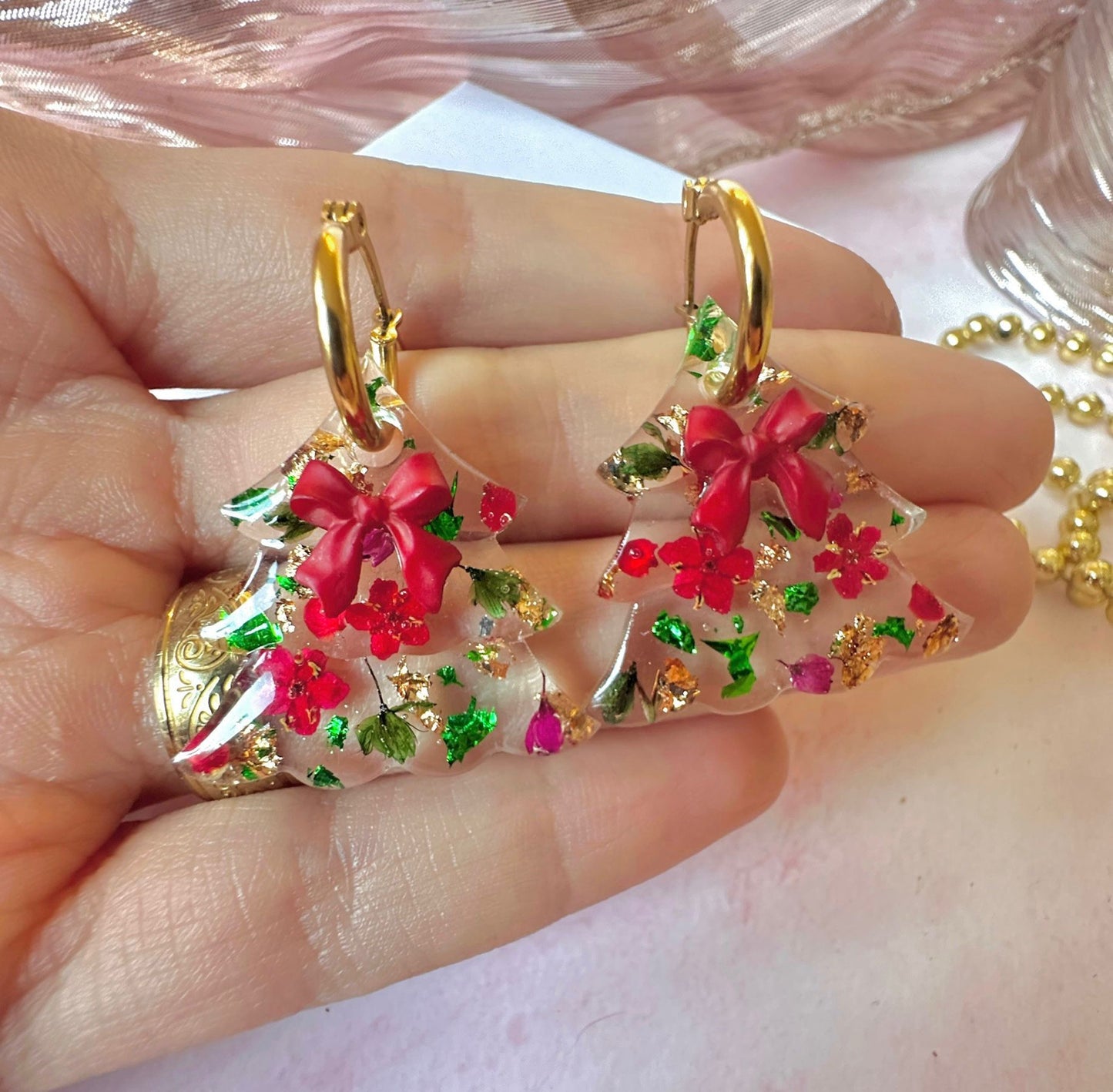 Bloom bow Christmas Tree earrings.