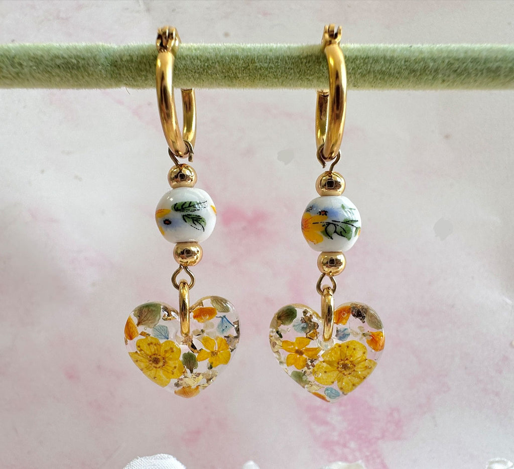 Sunflower Bead Blossom heart drop hoop earrings.