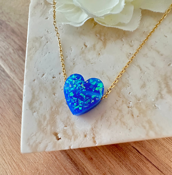 Gold Midnight Blue Opal effect heart necklace.