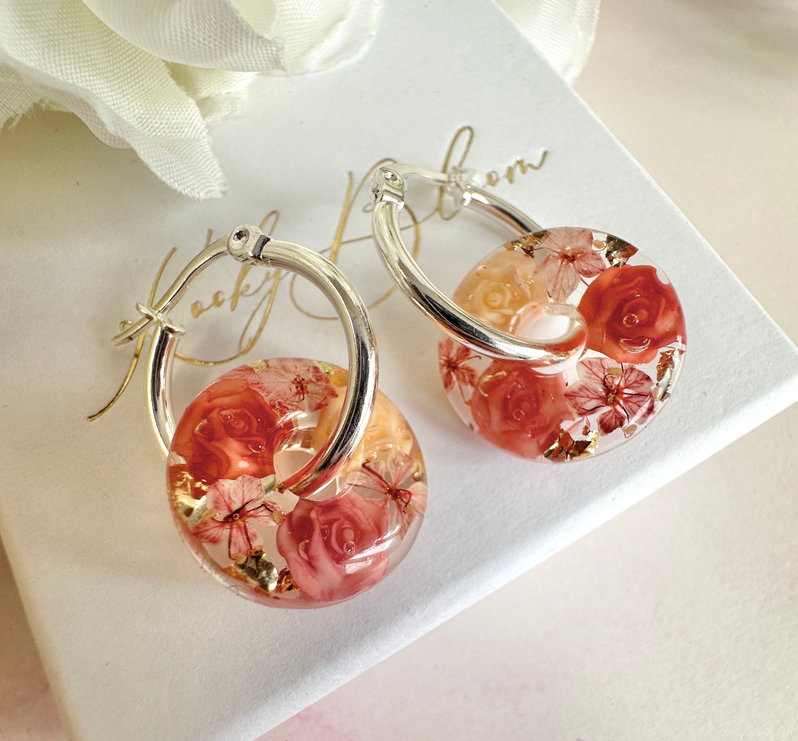 Terracotta rose donut hoop earrings.