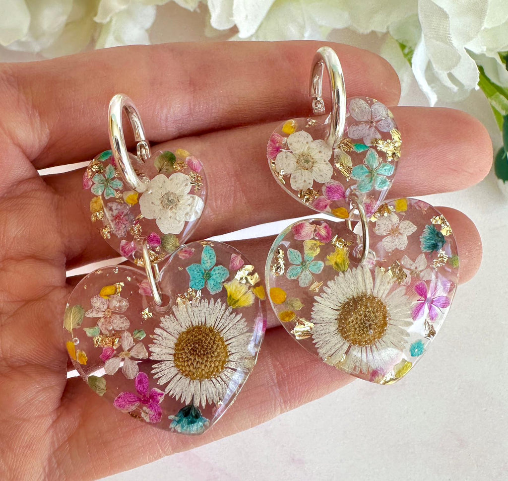 Daisy confetti double heart drop hoop earrings.