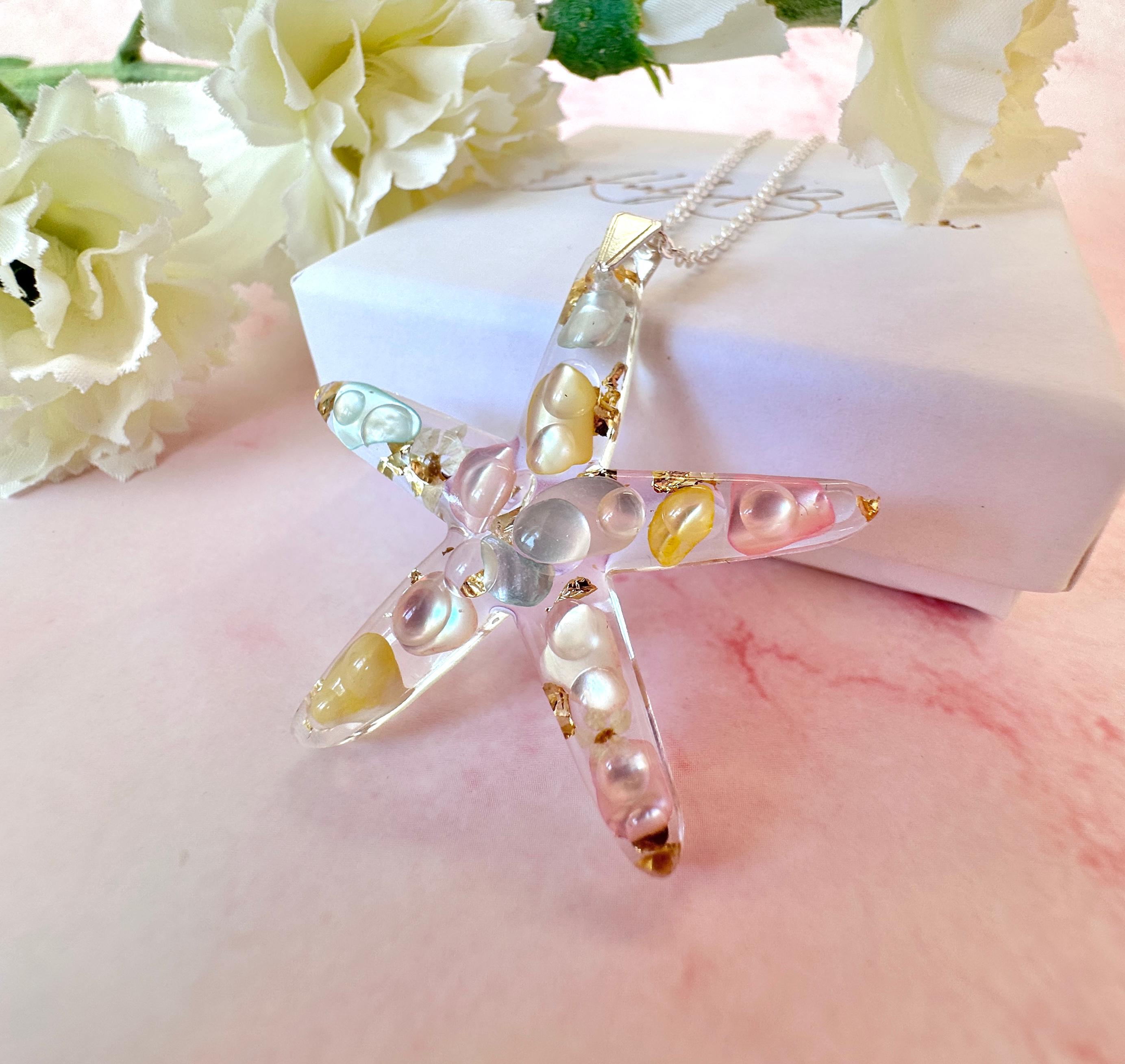 Silver Starfish seashell necklace.