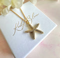 Gold cz starfish necklace.