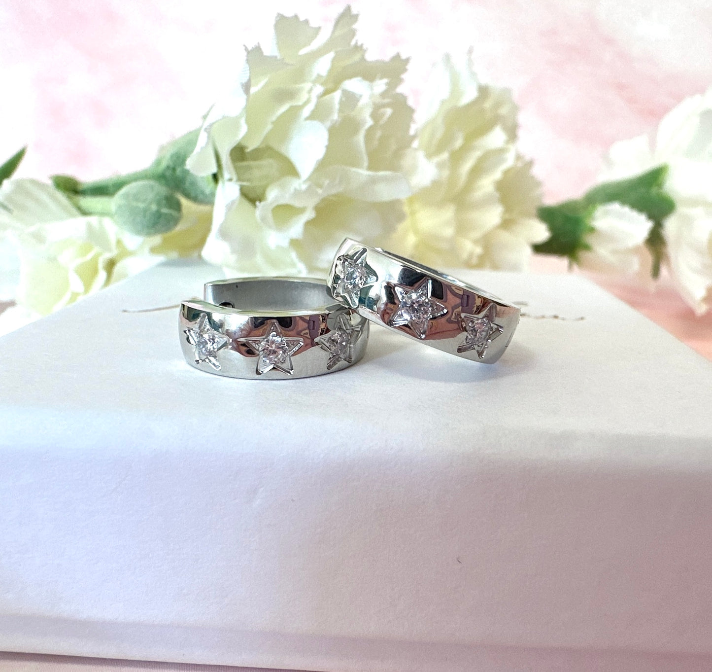 Small Silver Chunky clear CZ star Huggie earrings.