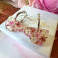 Autumn Brew Bloom flower teacup earrings.