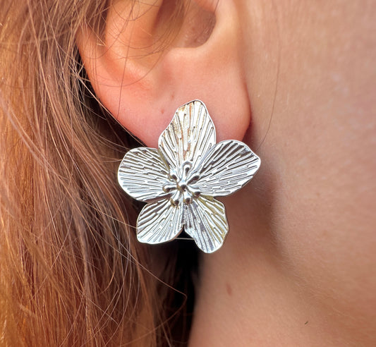 Silver Oversized Flower stud earrings.