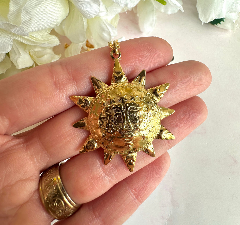 Gold engraved Sun face necklace