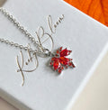 Silver CZ Autumn leaf necklace.