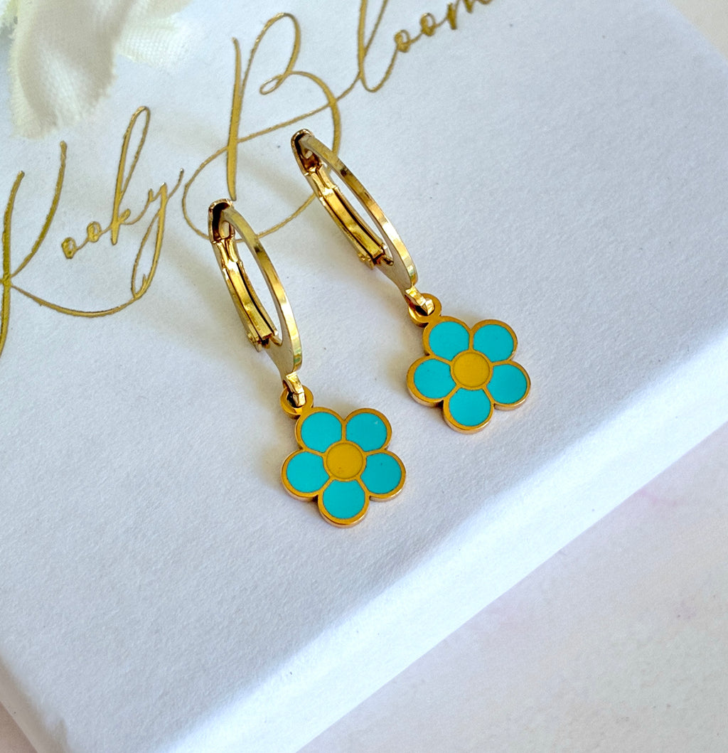 Gold tiny Blue daisy huggie earrings.