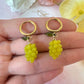 Green grape gold earrings.