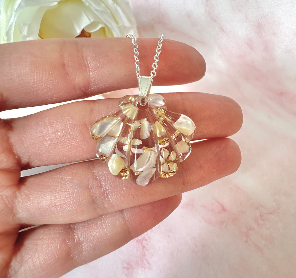 Silver Champagne Seashell Bloom necklace.