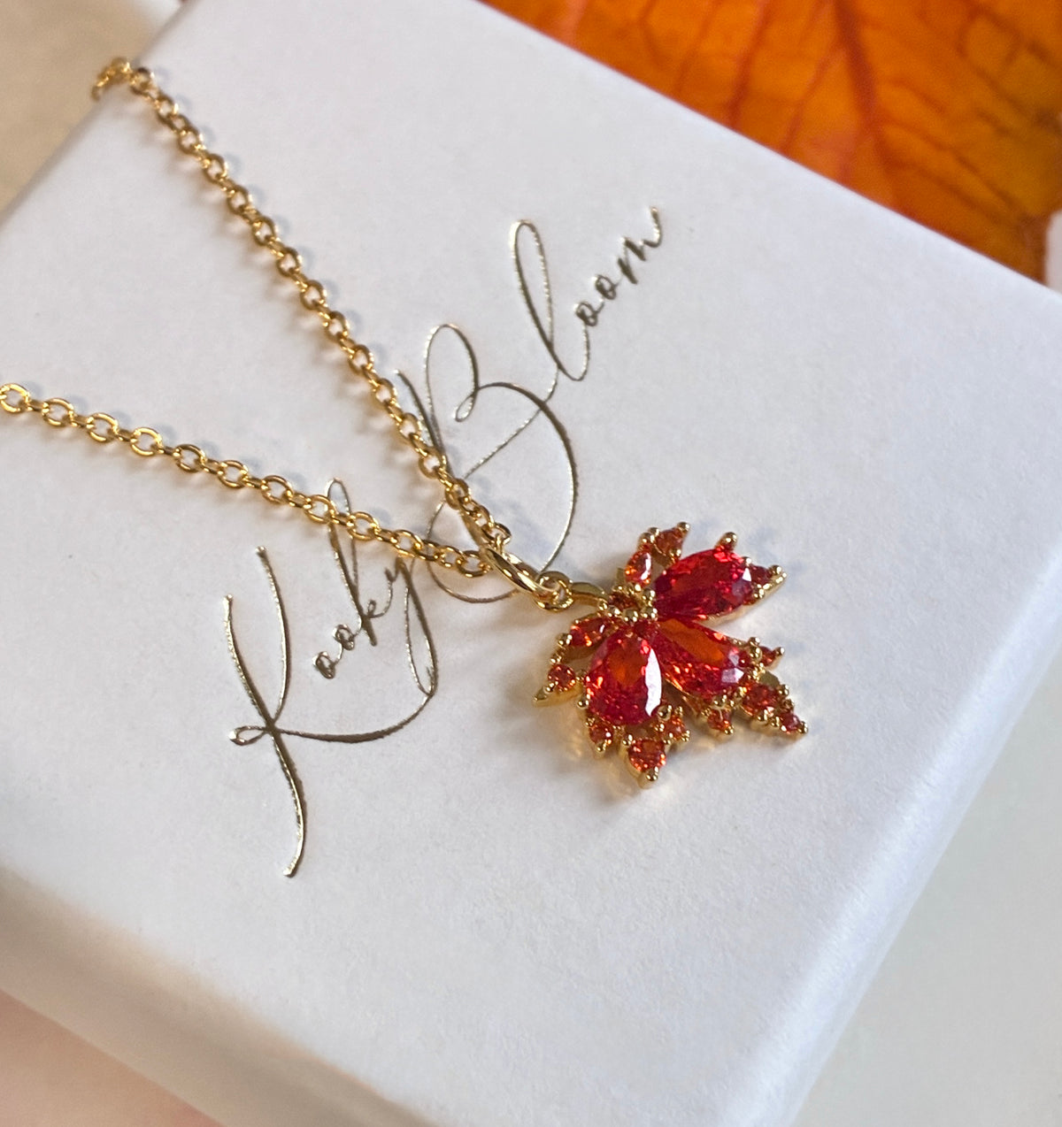Gold CZ Autumn leaf necklace.
