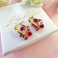 Tiny Dark Pink bloom flower earrings.