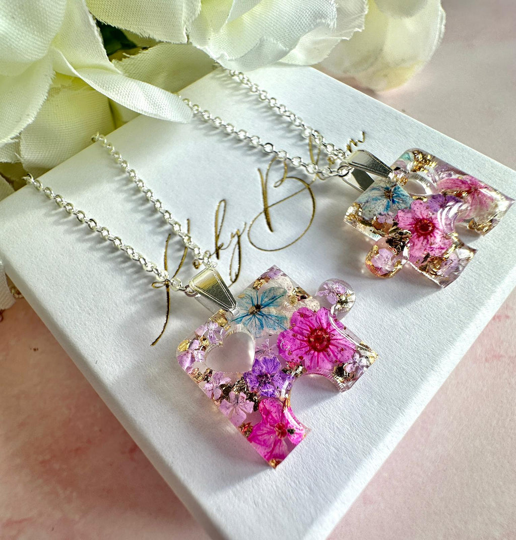 Silver real flower Puzzle piece Necklace.