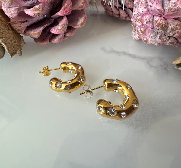 Gold wobbly Chunky CZ Hoop earrings.