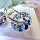 Denim Donut bloom earrings.