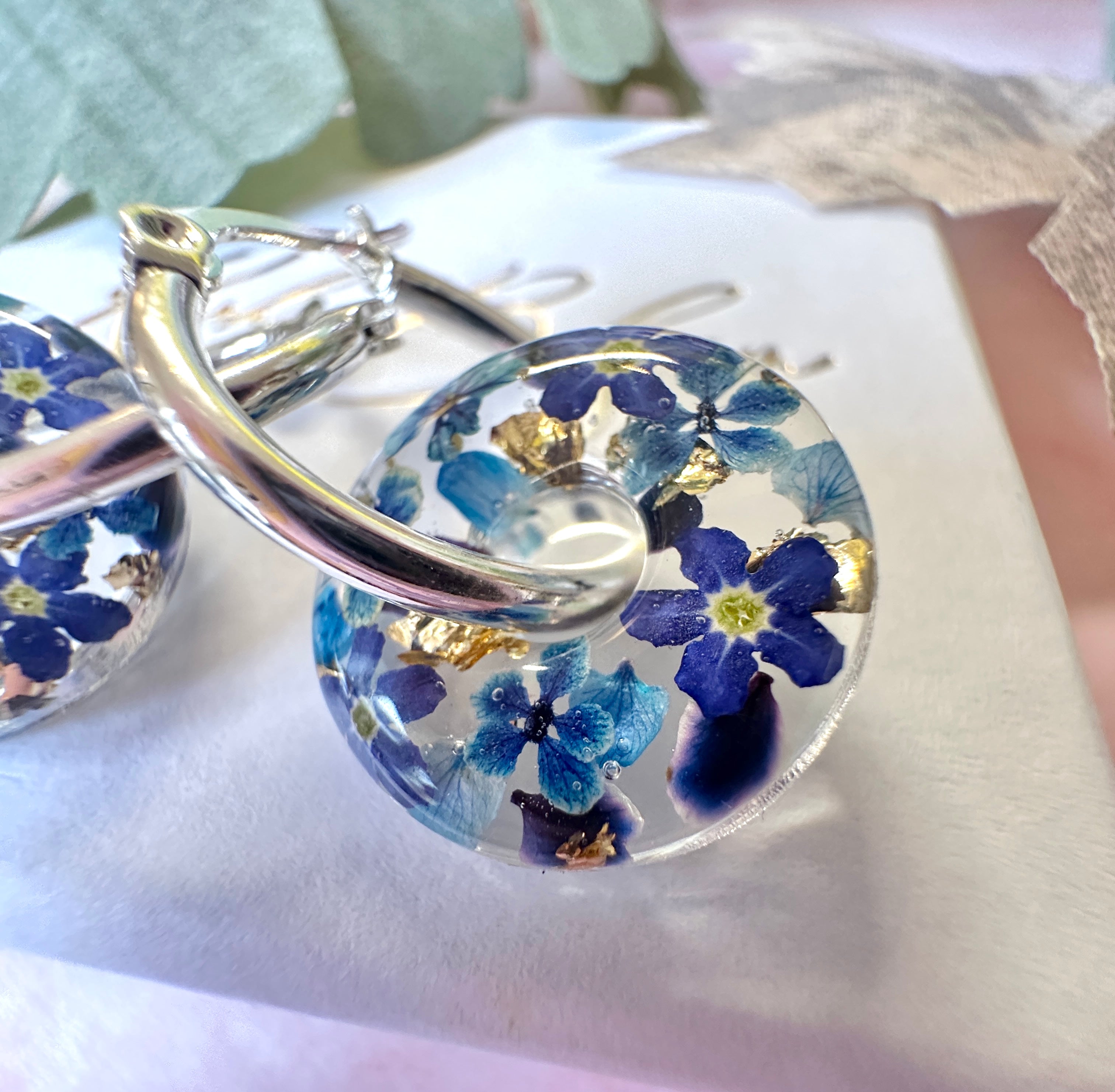 Denim Donut bloom earrings.