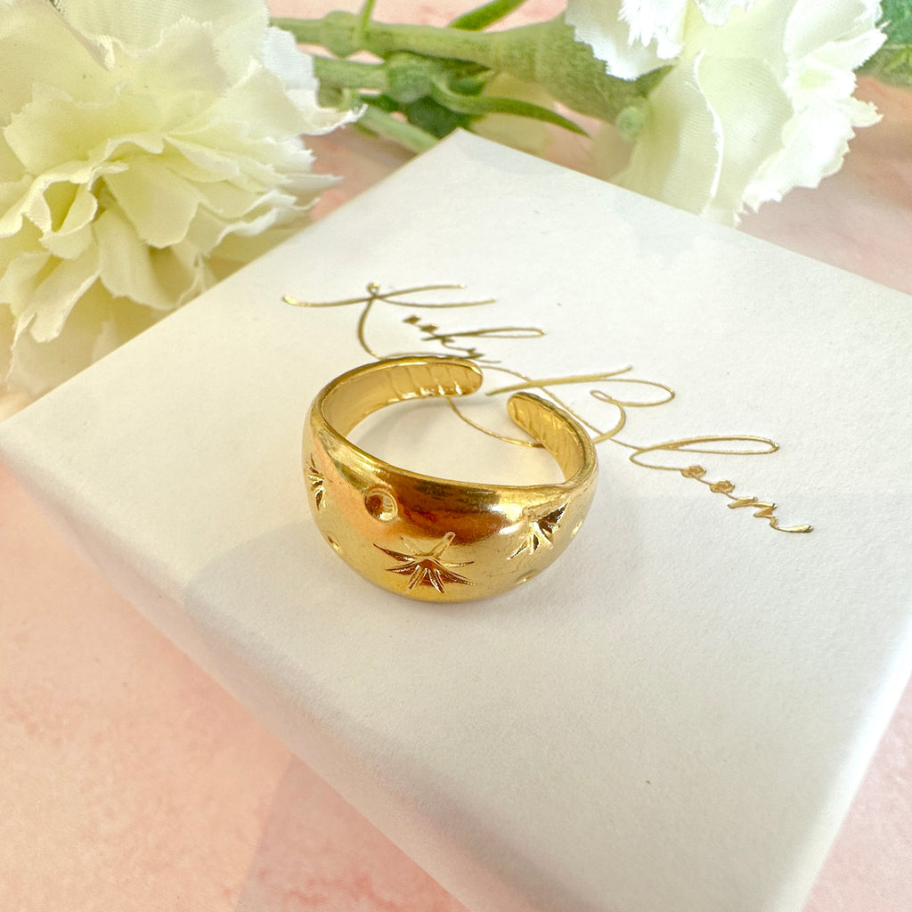 Gold domed celestial ring.