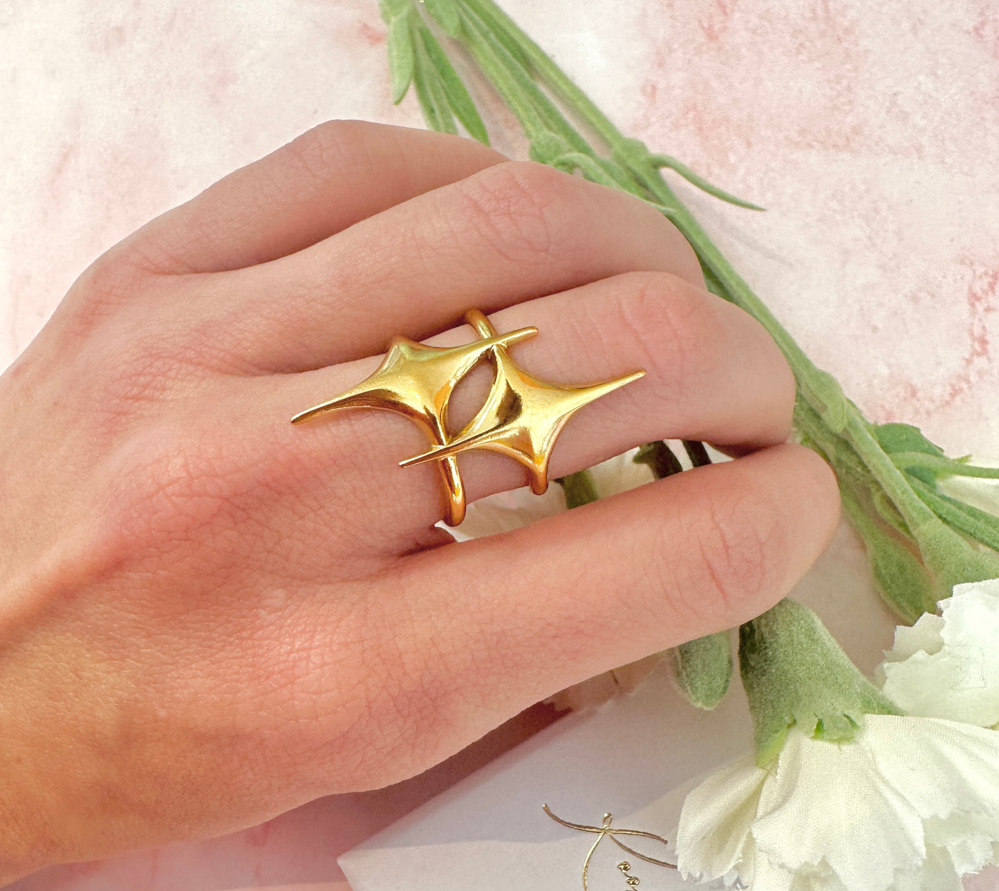 Gold statement double star adjustable ring.