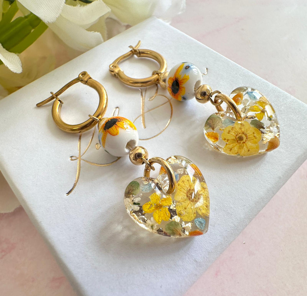 Sunflower Bead Blossom heart drop hoop earrings.