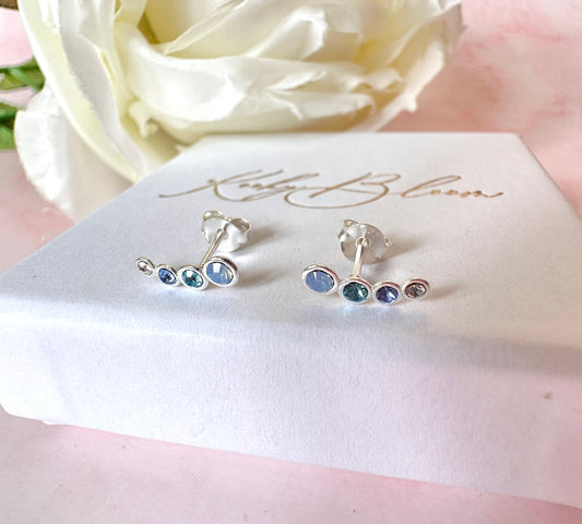 925 Sterling Silver Blue stone climber stud earrings.