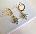 Gold Tiny Cz Blue stone Star huggie earrings.