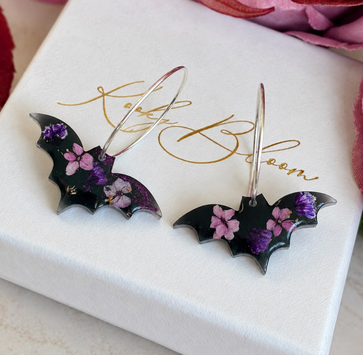 Black purple bloom Bat hoop earrings.