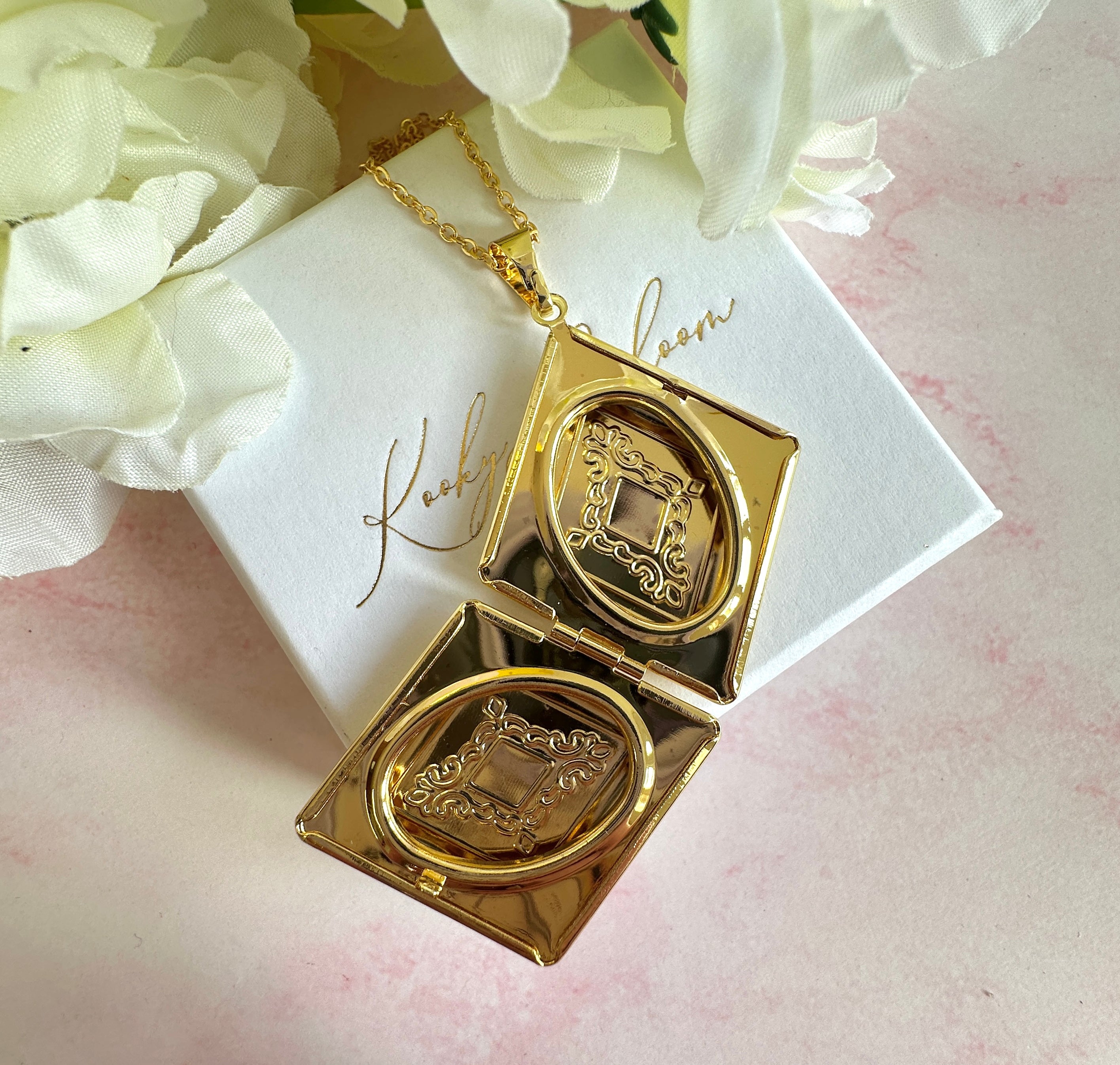 Gold Rhombus Locket necklace.
