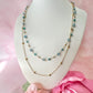 Gold layered blue bead necklace.
