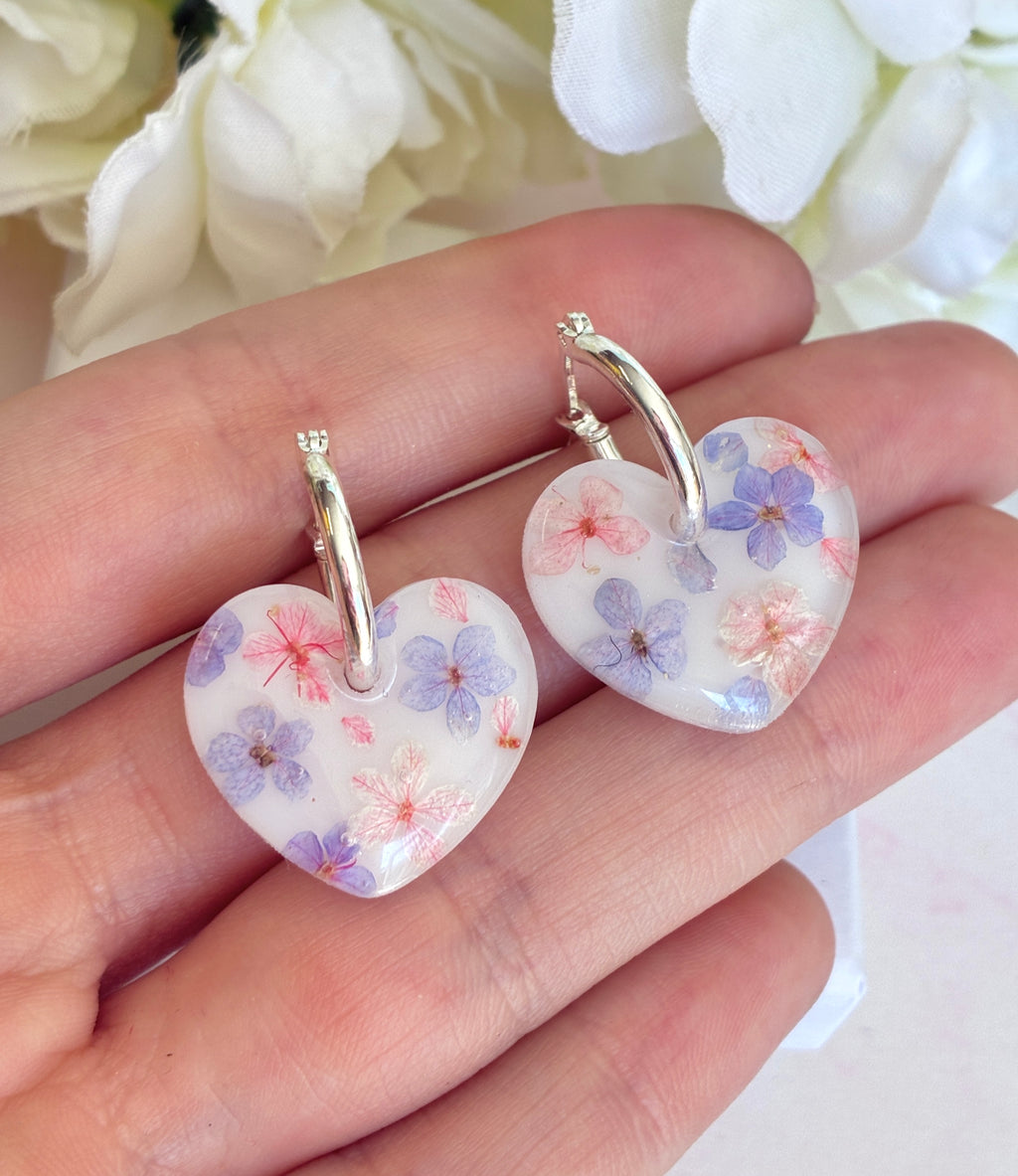 Marshmallow bloom heart earrings.