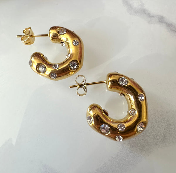 Gold wobbly Chunky CZ Hoop earrings.