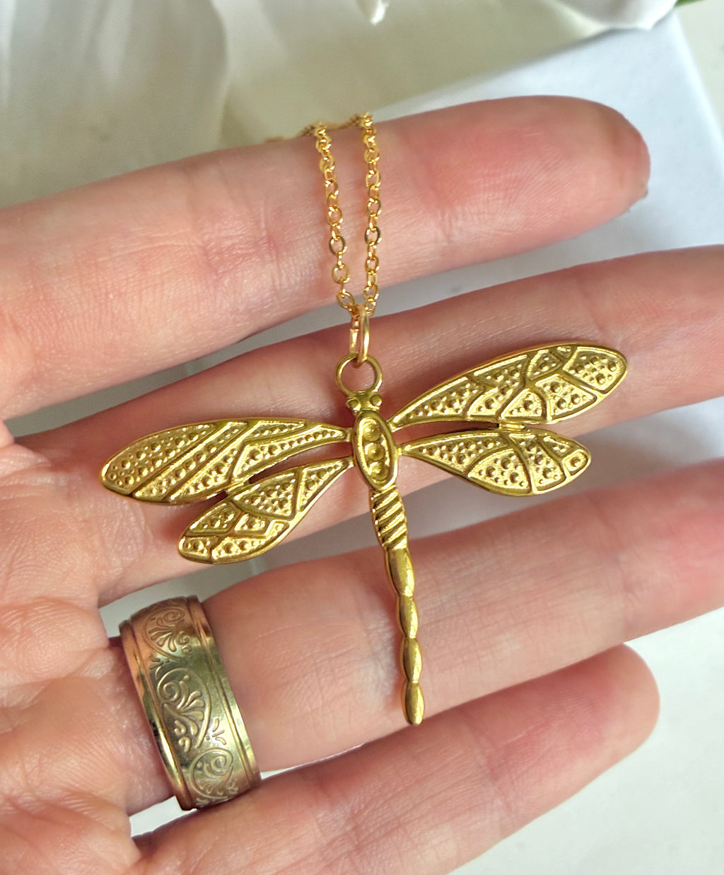 Gold Dragonfly necklace.