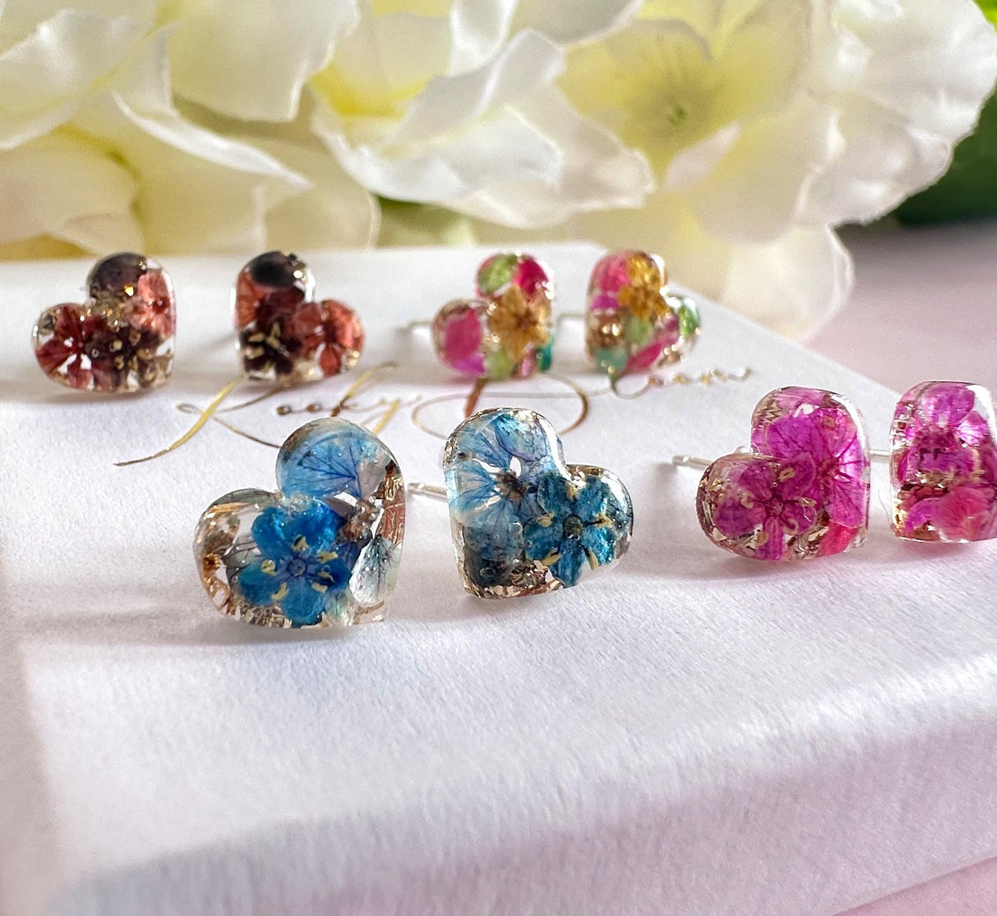 Teeny Bloom heart 925 sterling silver stud earrings.