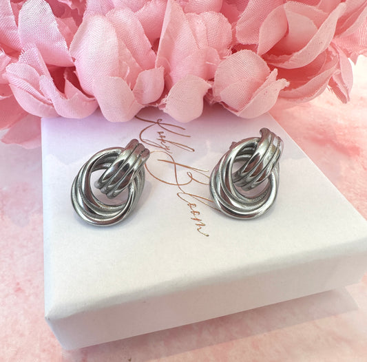 Silver Loop chunky stud earrings.