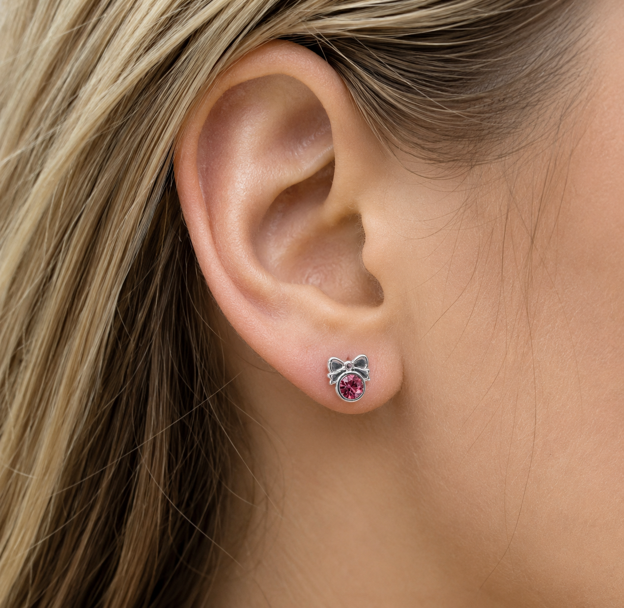 925 sterling silver Pink CZ Bow stud earrings.