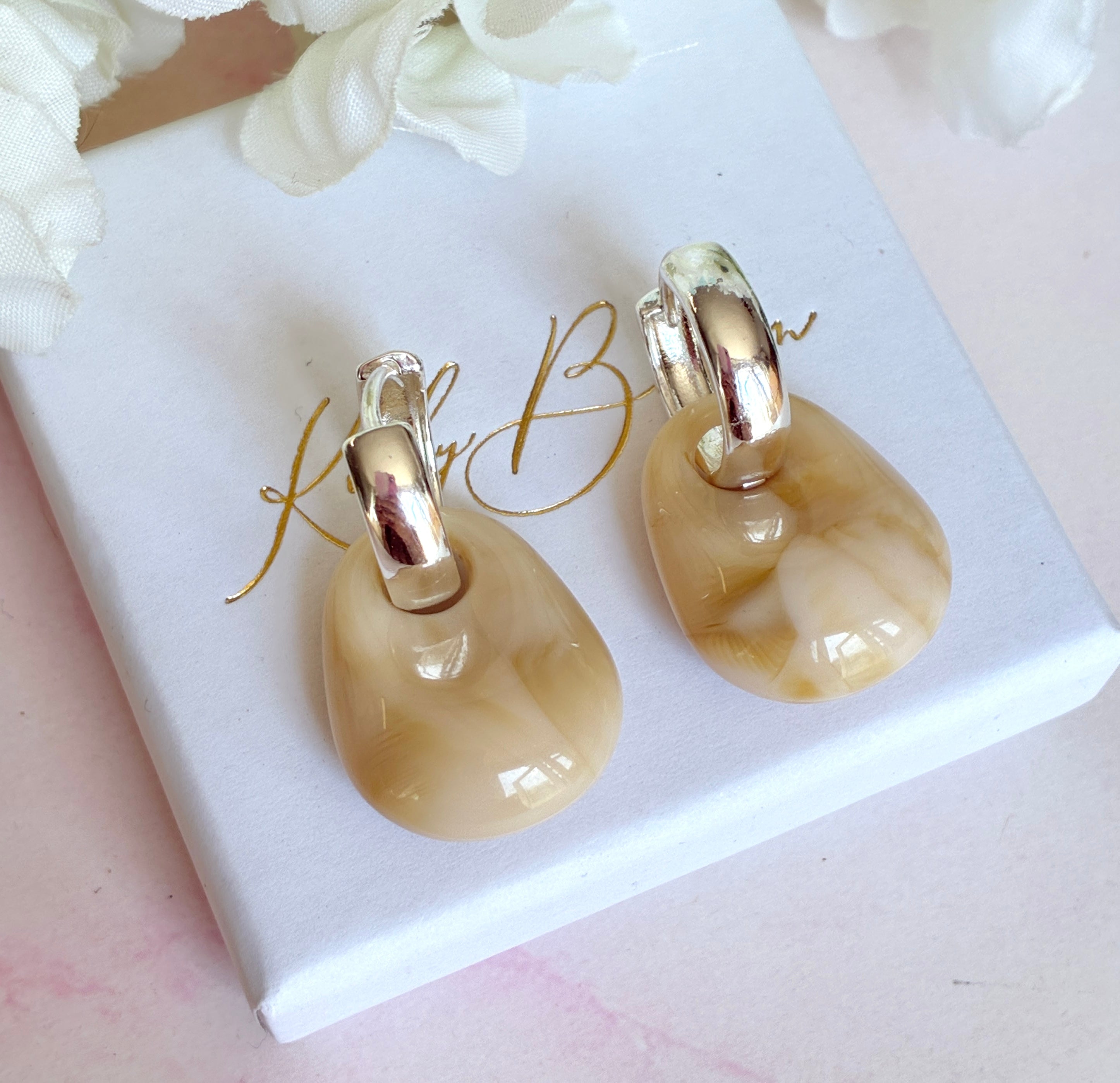 Silver chunky stone earrings.