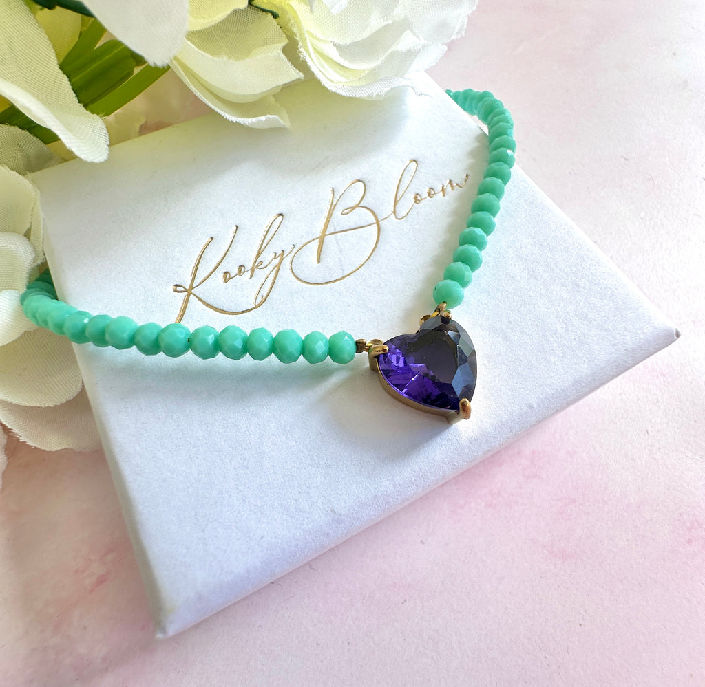 Gold turquoise beaded Purple CZ heart necklace.