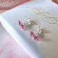 925 Sterling Silver Pink bow stud earrings.