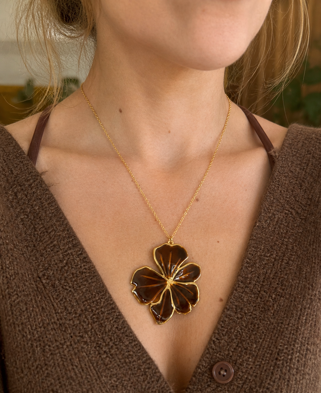 Gold brown oversized flower necklace.