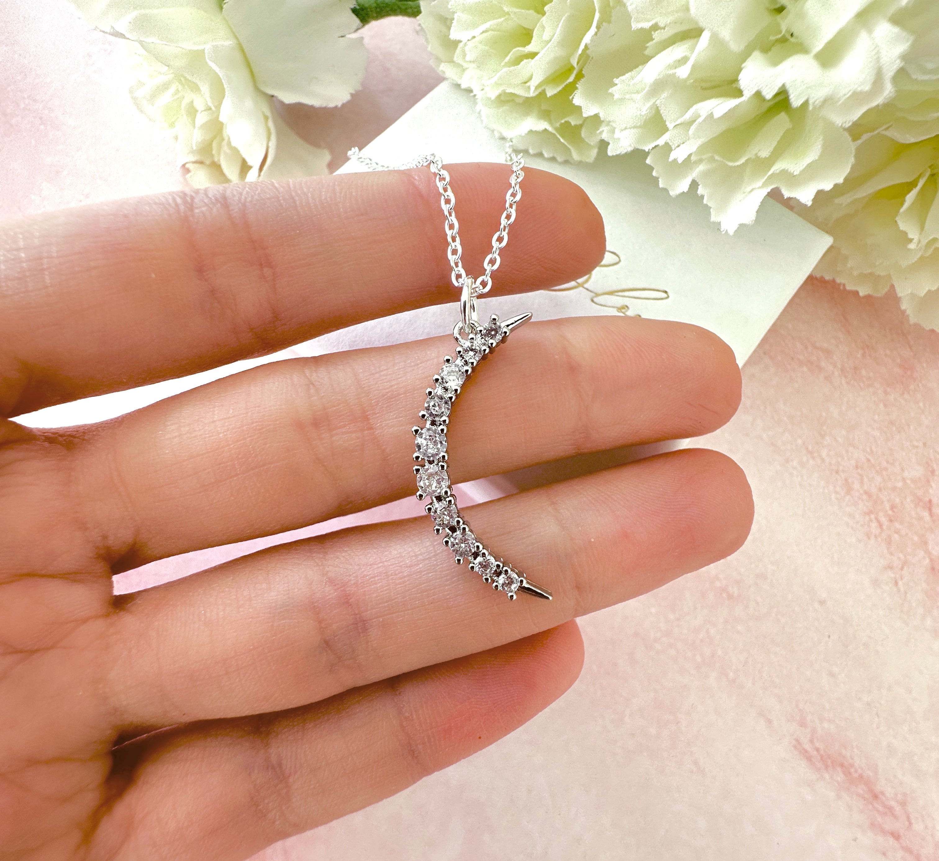 Silver cz Long Moon necklace.