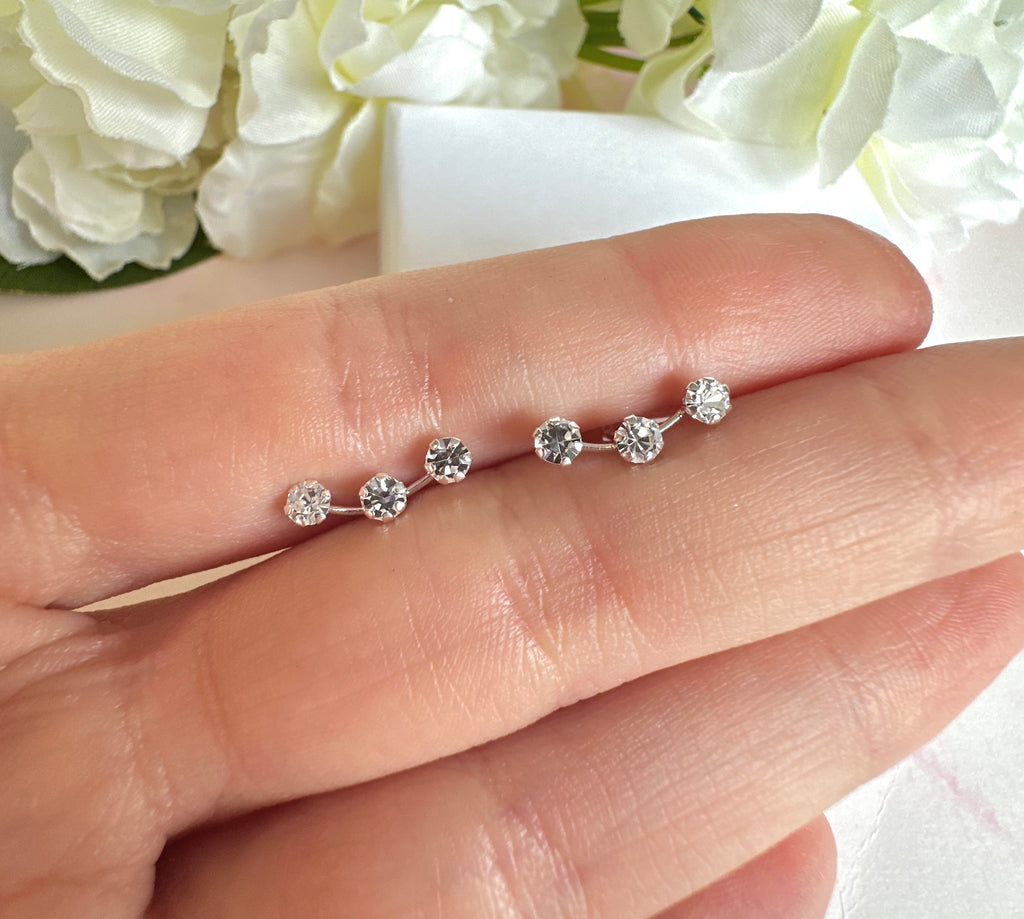925 sterling silver Triple CZ climber stud earrings.