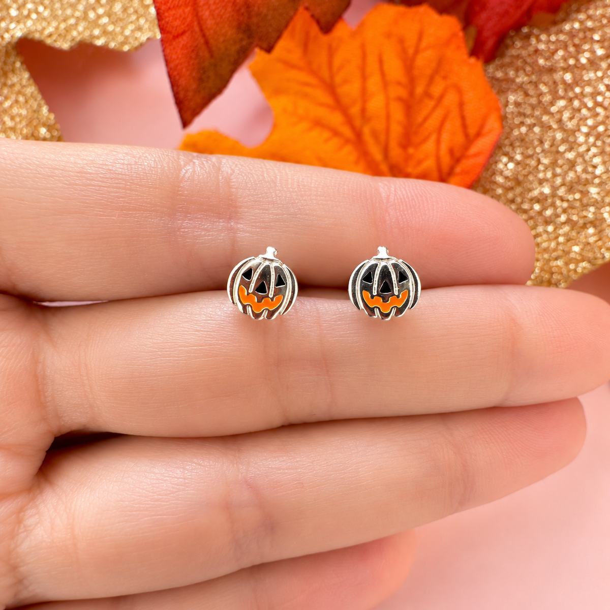 925 sterling silver Pumpkin face studs.