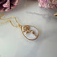 Gold Sunflower Shell Teardrop necklace.