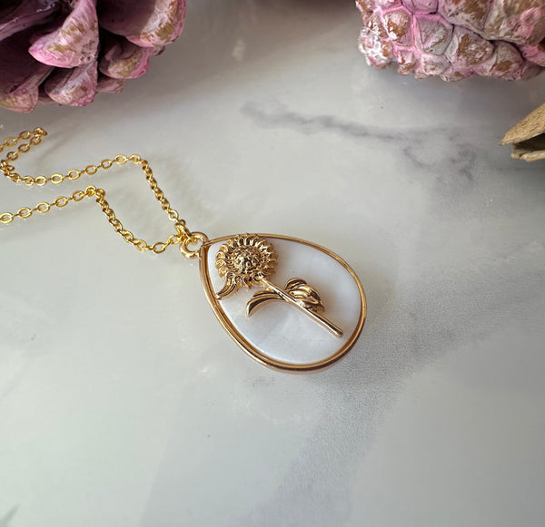 Gold Sunflower Shell Teardrop necklace.
