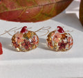 Small woodland Bloom Pumpkin stud earrings.