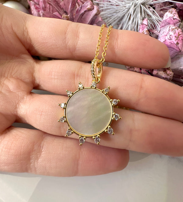Gold Shell Sun CZ necklace.