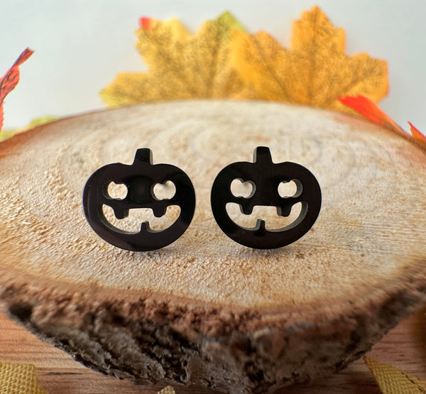 Black pumpkin stud earrings.