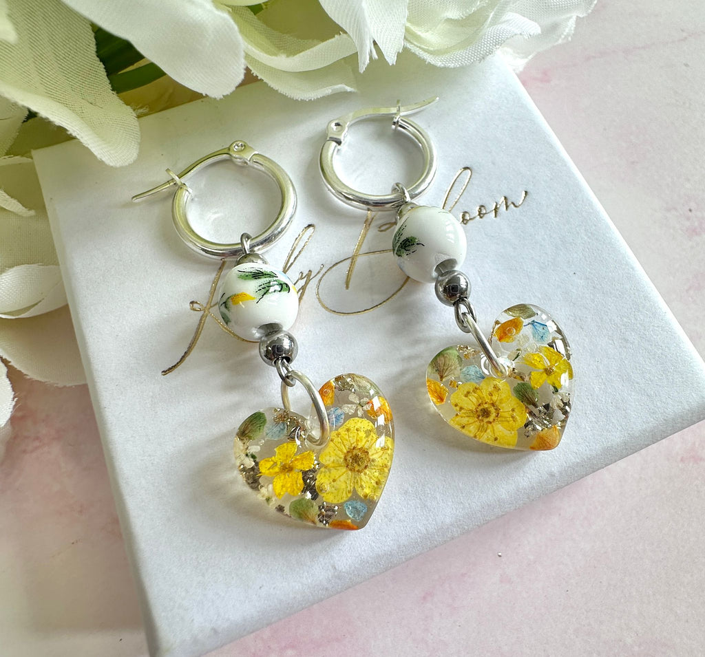 Sunflower Bead Blossom heart drop hoop earrings.