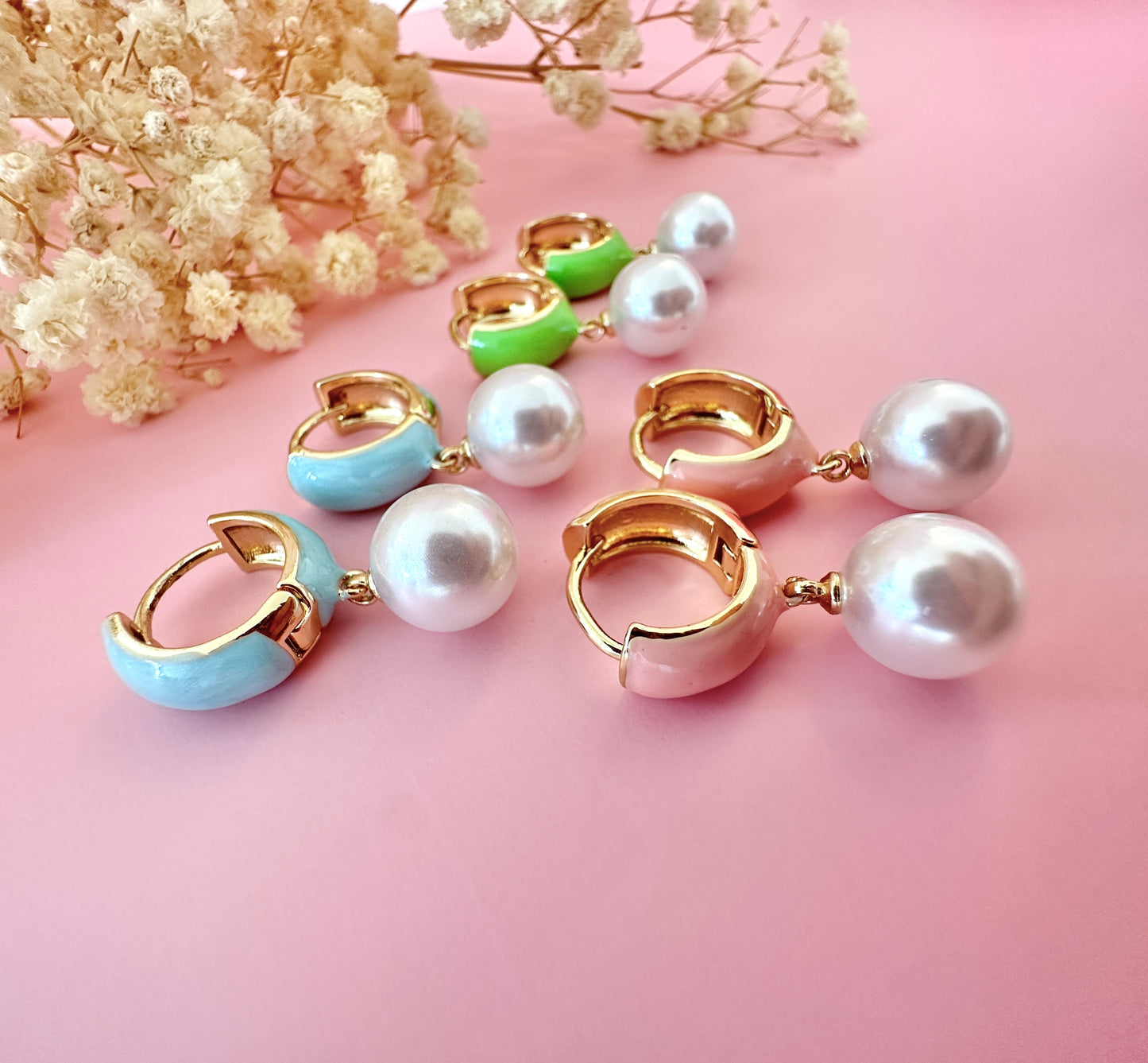 Gold Enamel Pearl drop Huggie earrings.