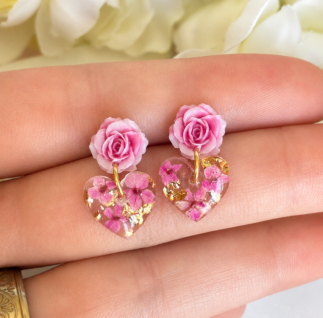 Pink Rose Drop Heart bloom stud earrings.